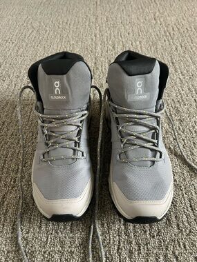 On Running Cloudrock womens Gray and Black Hiking Boots with Yellow-Accent Laces